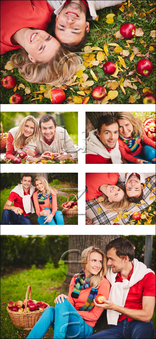 Couple with apple - stock photo