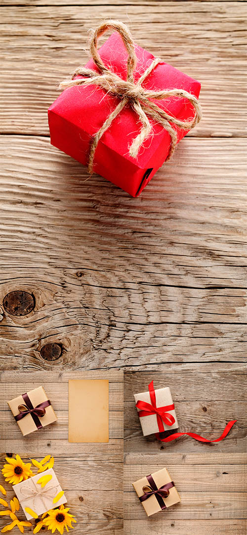 Gifts on wooden background -    