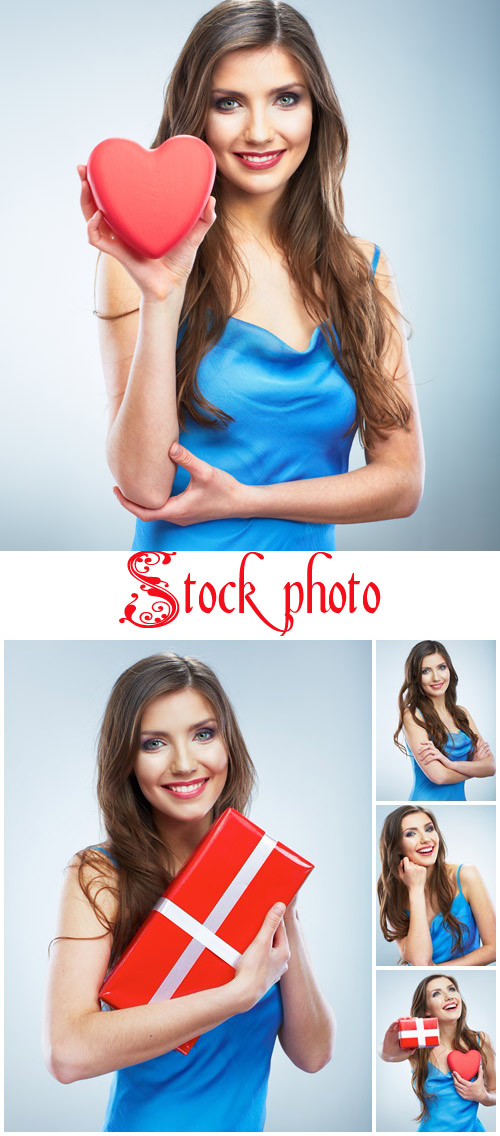 Young happy woman hold Love symbol red heart - stock photo