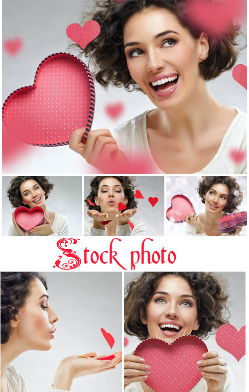 Brunette  smailed woman with heart - stock photo